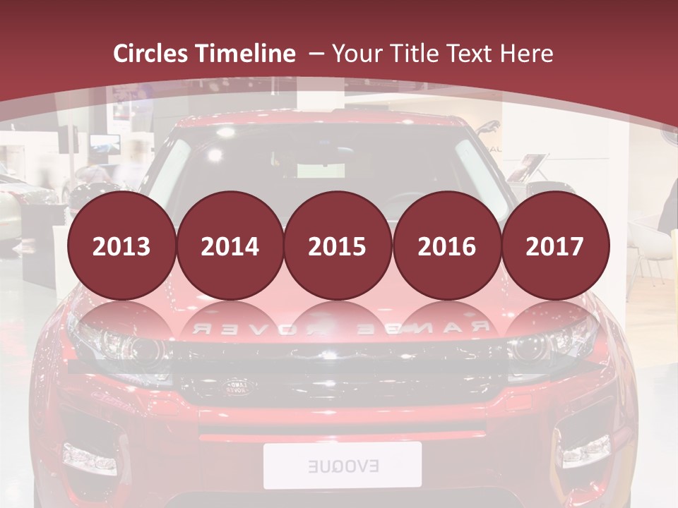 A Red Car Is On Display At A Show PowerPoint Template