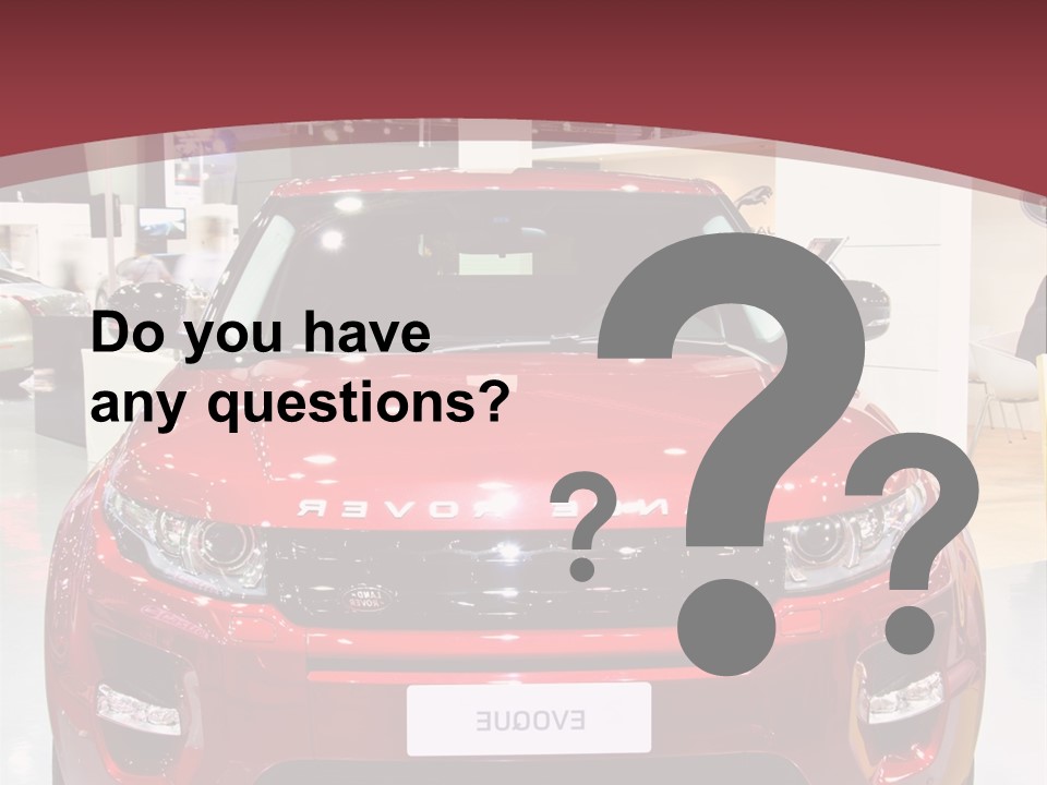 A Red Car Is On Display At A Show PowerPoint Template