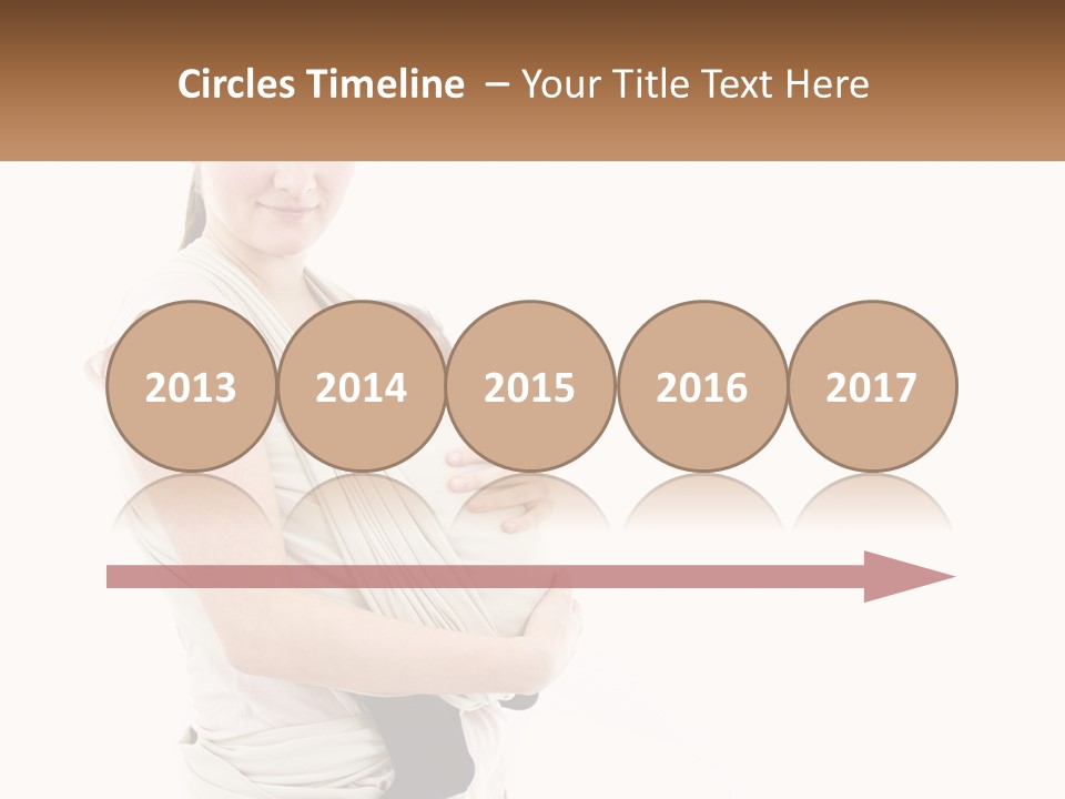A Woman Holding A Baby Wrapped In A Sling PowerPoint Template