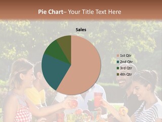 A Group Of People Sitting Around A Table With Food PowerPoint Template