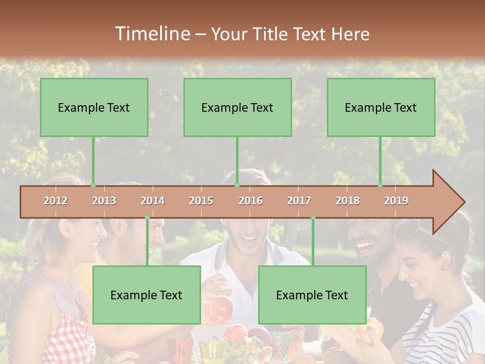 A Group Of People Sitting Around A Table With Food PowerPoint Template