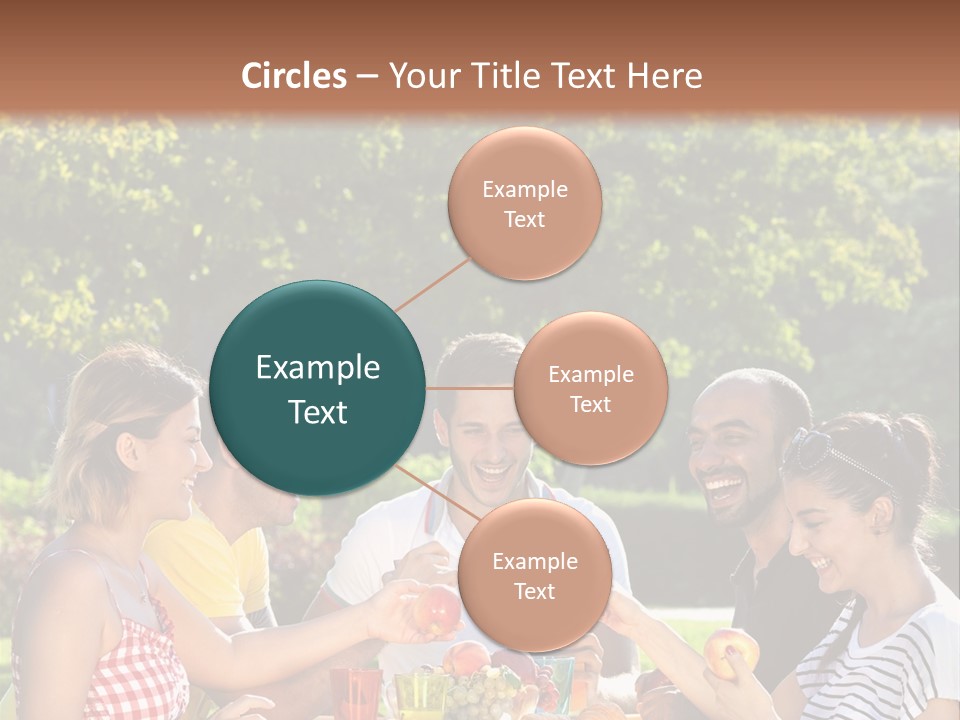 A Group Of People Sitting Around A Table With Food PowerPoint Template