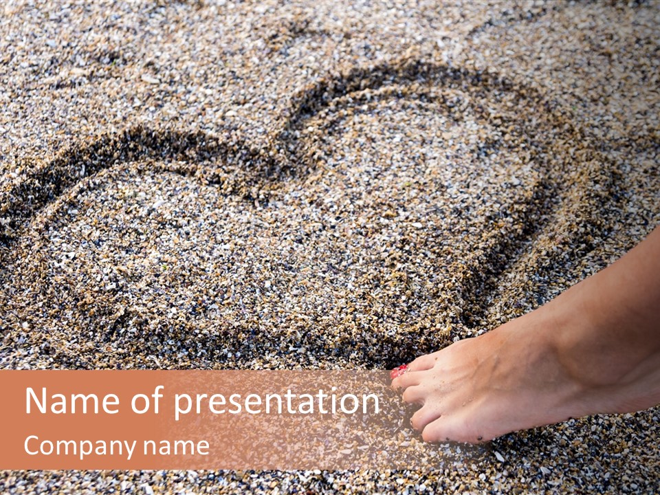A Person's Feet In The Sand With A Heart Drawn On It PowerPoint Template