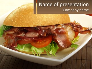 A Sandwich With Bacon And Lettuce On A Plate PowerPoint Template