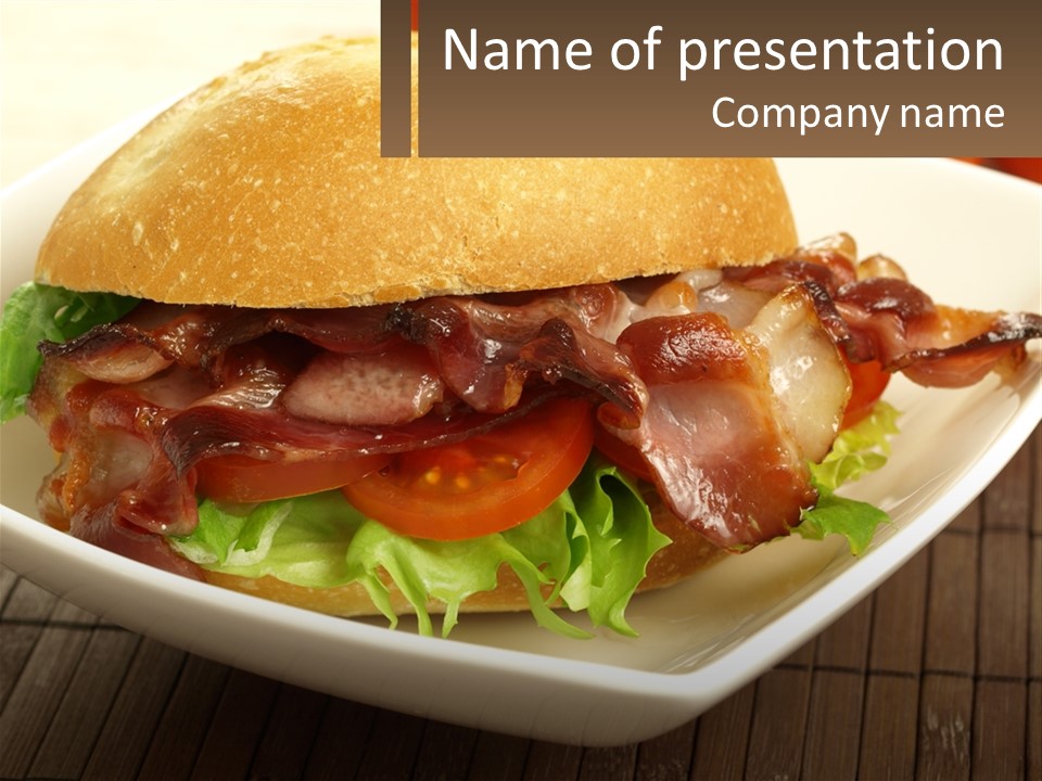 A Sandwich With Bacon And Lettuce On A Plate PowerPoint Template