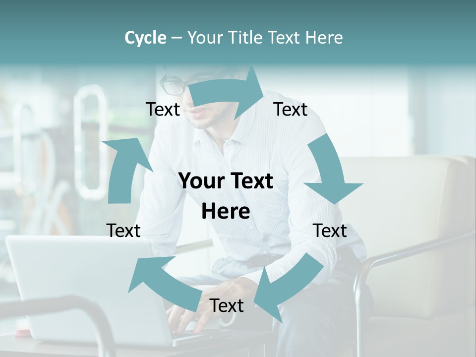 A Man Sitting At A Table Using A Laptop Computer PowerPoint Template