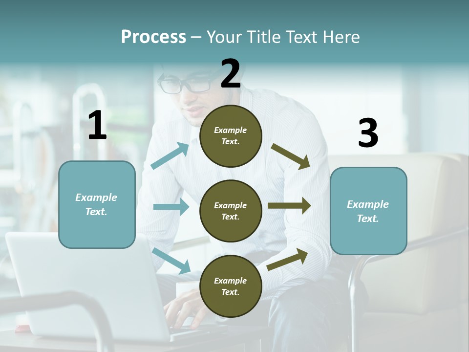A Man Sitting At A Table Using A Laptop Computer PowerPoint Template