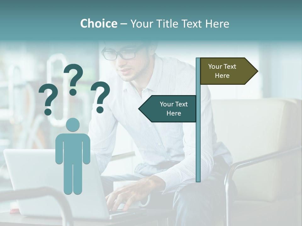 A Man Sitting At A Table Using A Laptop Computer PowerPoint Template
