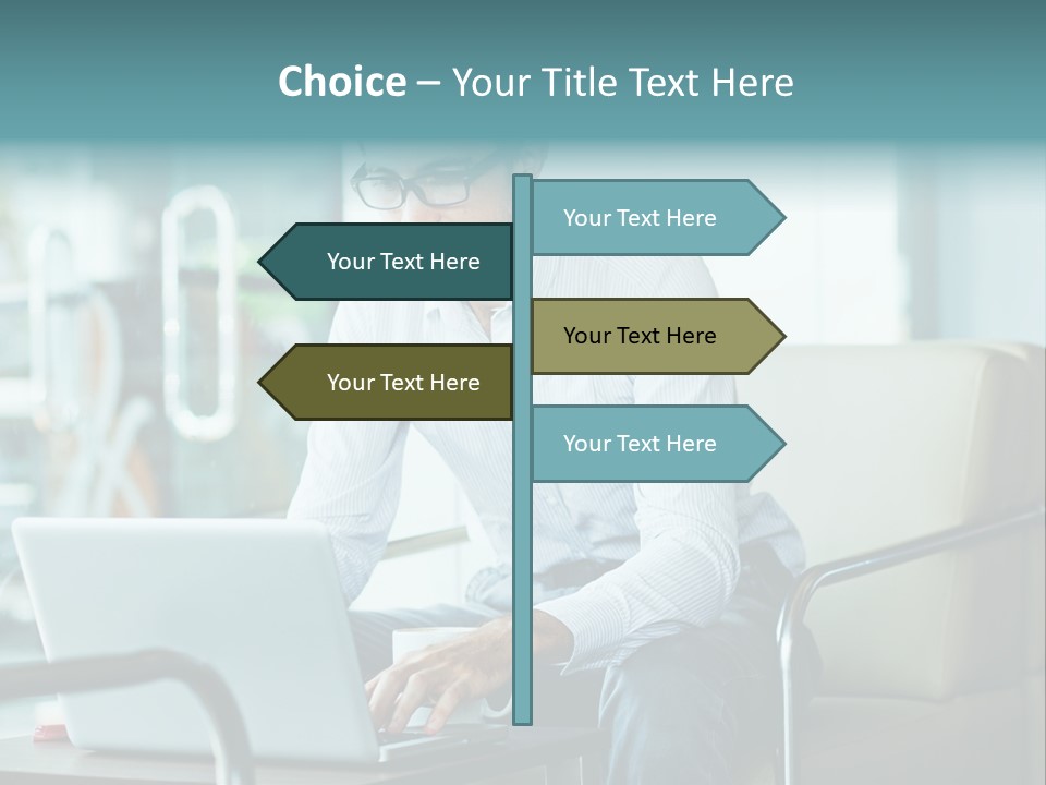 A Man Sitting At A Table Using A Laptop Computer PowerPoint Template