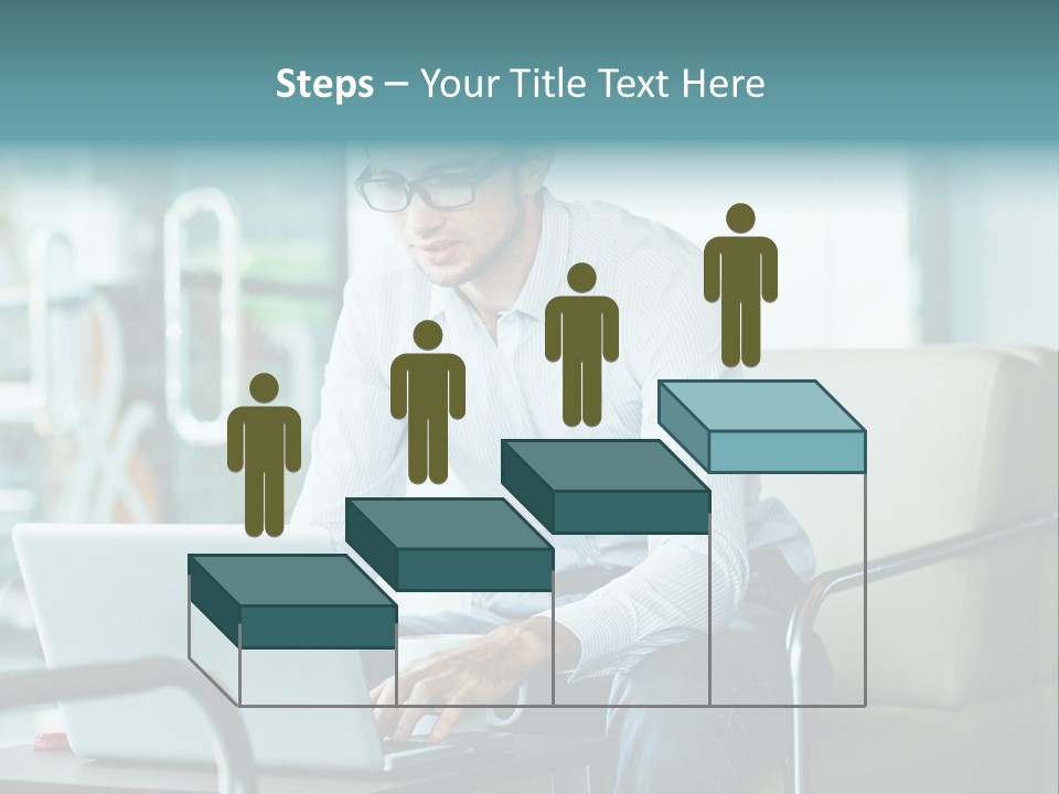 A Man Sitting At A Table Using A Laptop Computer PowerPoint Template