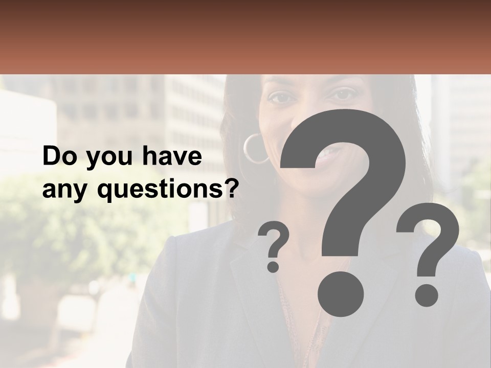 A Woman In A Business Suit Is Smiling For The Camera PowerPoint Template