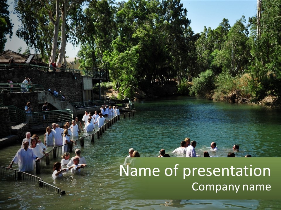 A Group Of People In White Shirts Are In The Water PowerPoint Template