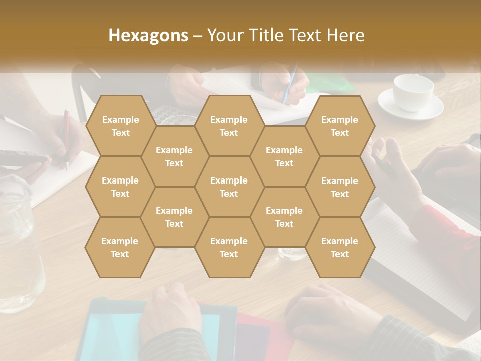 A Group Of People Sitting Around A Wooden Table PowerPoint Template