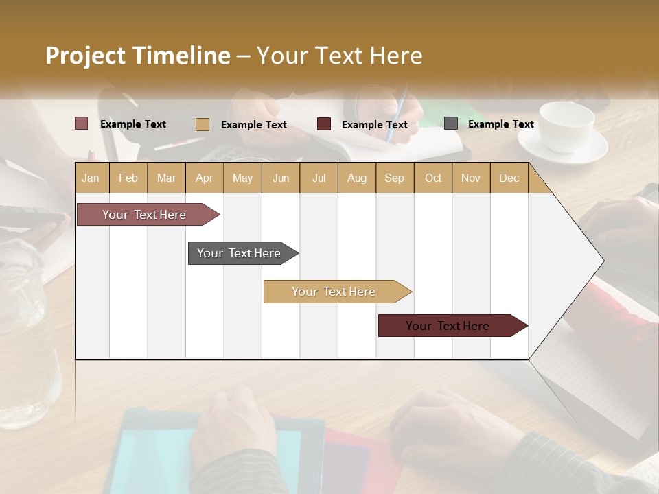 A Group Of People Sitting Around A Wooden Table PowerPoint Template