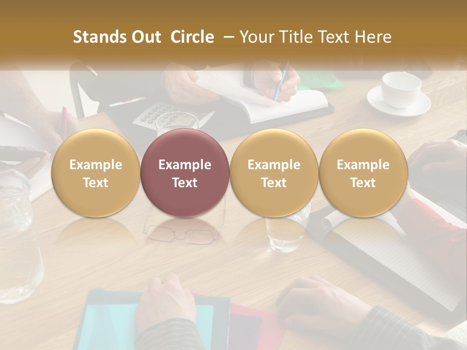 A Group Of People Sitting Around A Wooden Table PowerPoint Template
