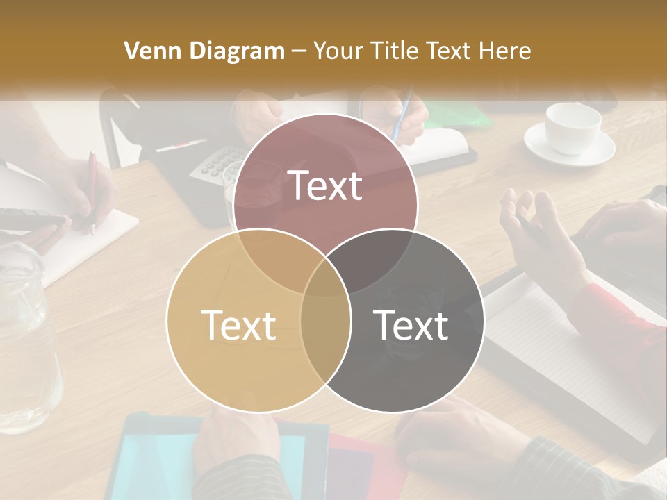 A Group Of People Sitting Around A Wooden Table PowerPoint Template