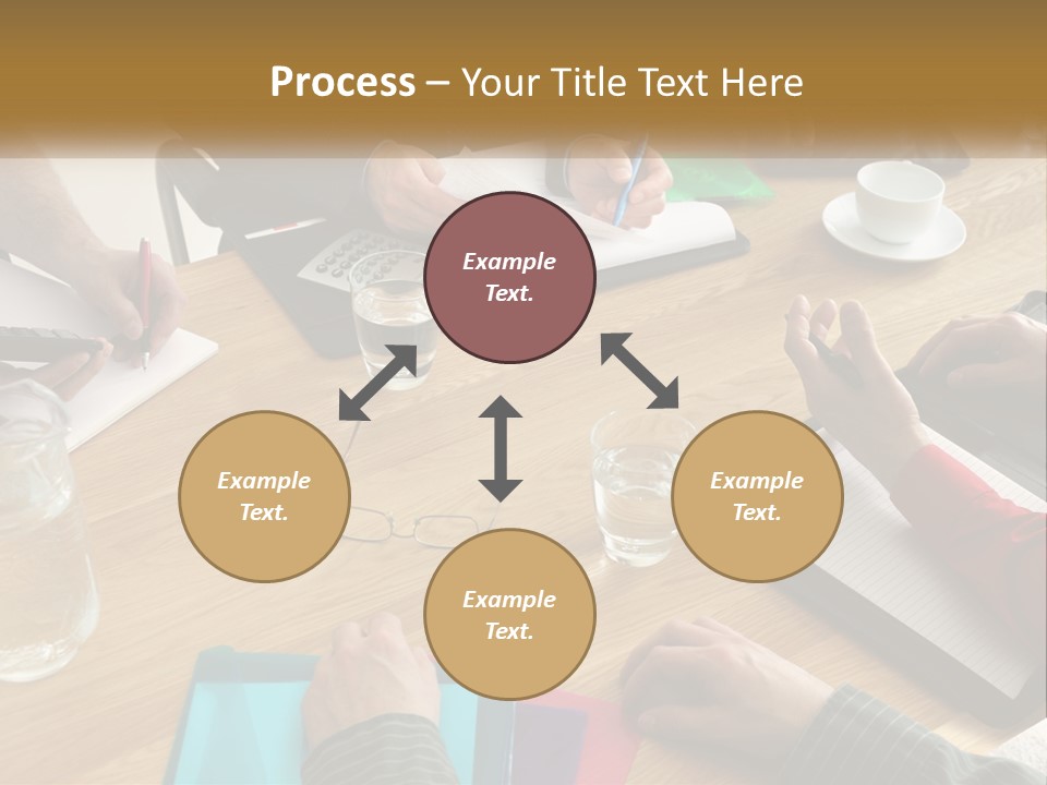 A Group Of People Sitting Around A Wooden Table PowerPoint Template