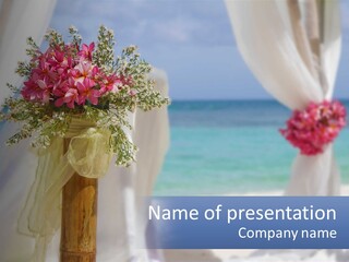 A Vase Filled With Pink Flowers Sitting On Top Of A Table PowerPoint Template