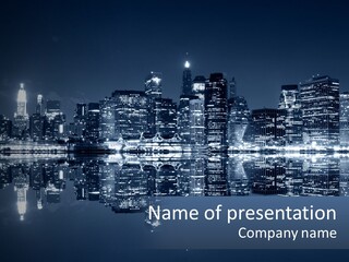 A City At Night With A Reflection In The Water PowerPoint Template