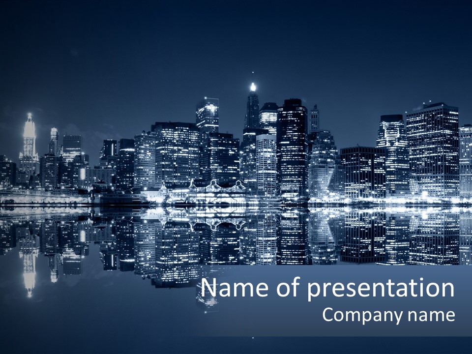A City At Night With A Reflection In The Water PowerPoint Template