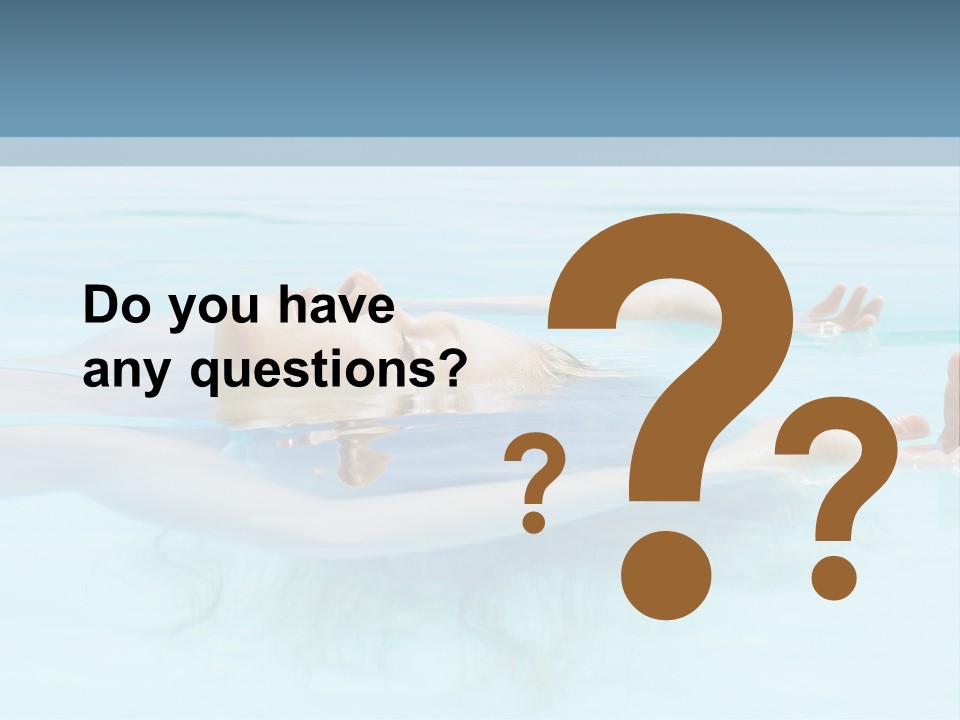 A Woman Floating In A Pool Of Water Powerpoint Template PowerPoint Template