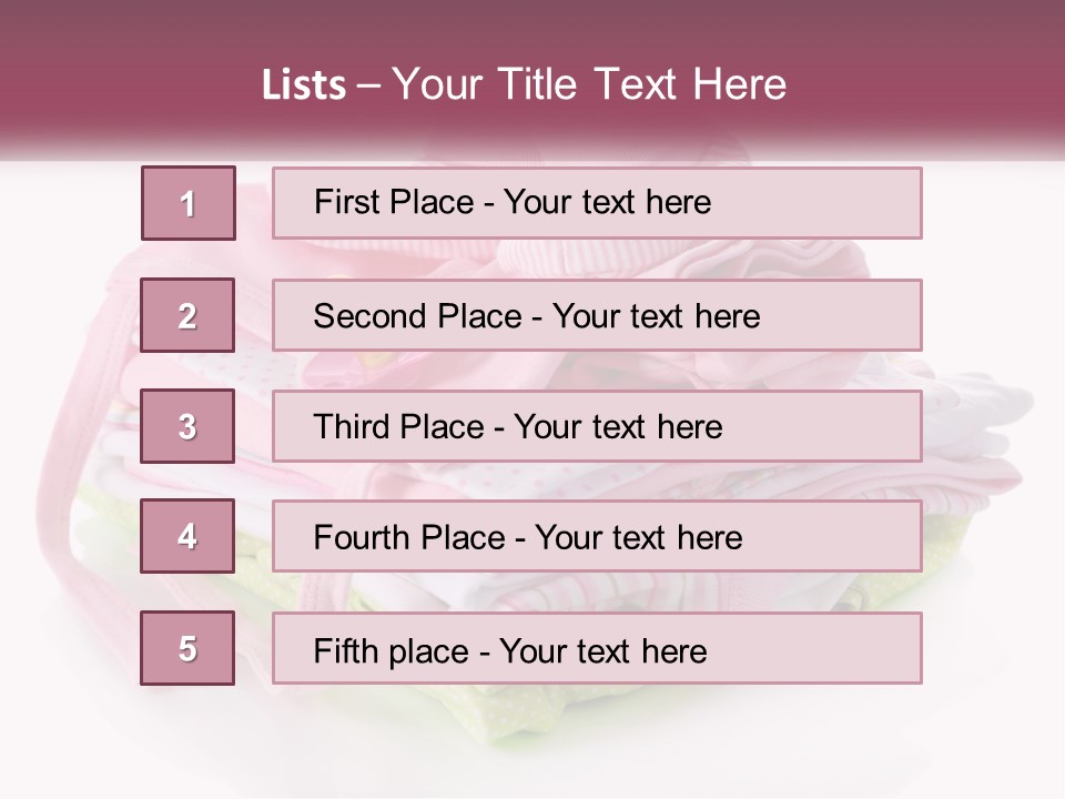 A Pile Of Baby Clothes With A Pacifier On Top Of It PowerPoint Template