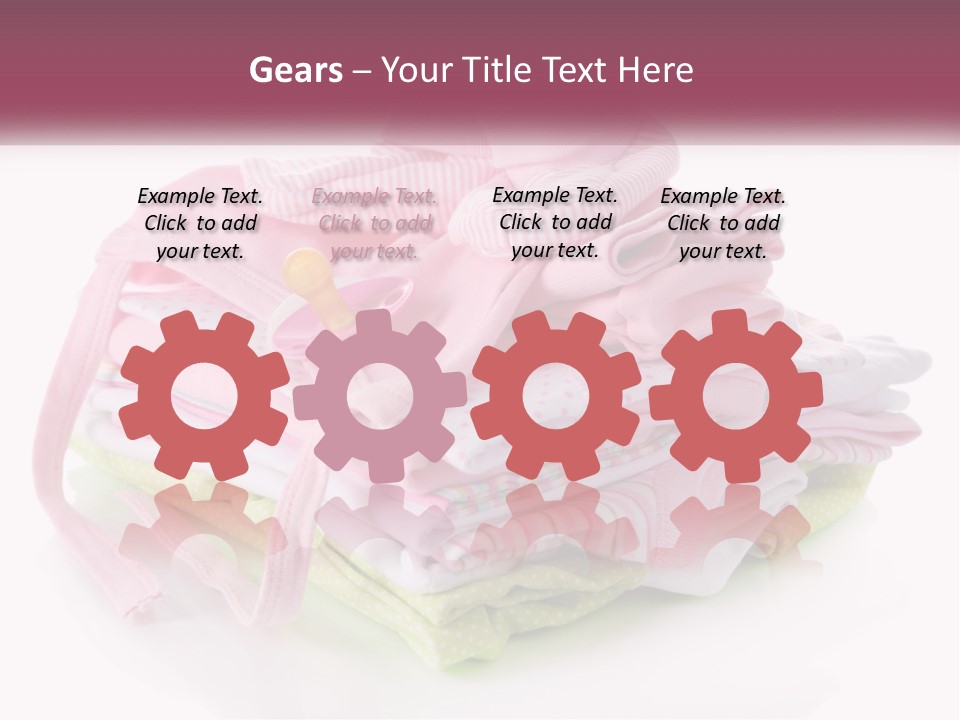 A Pile Of Baby Clothes With A Pacifier On Top Of It PowerPoint Template