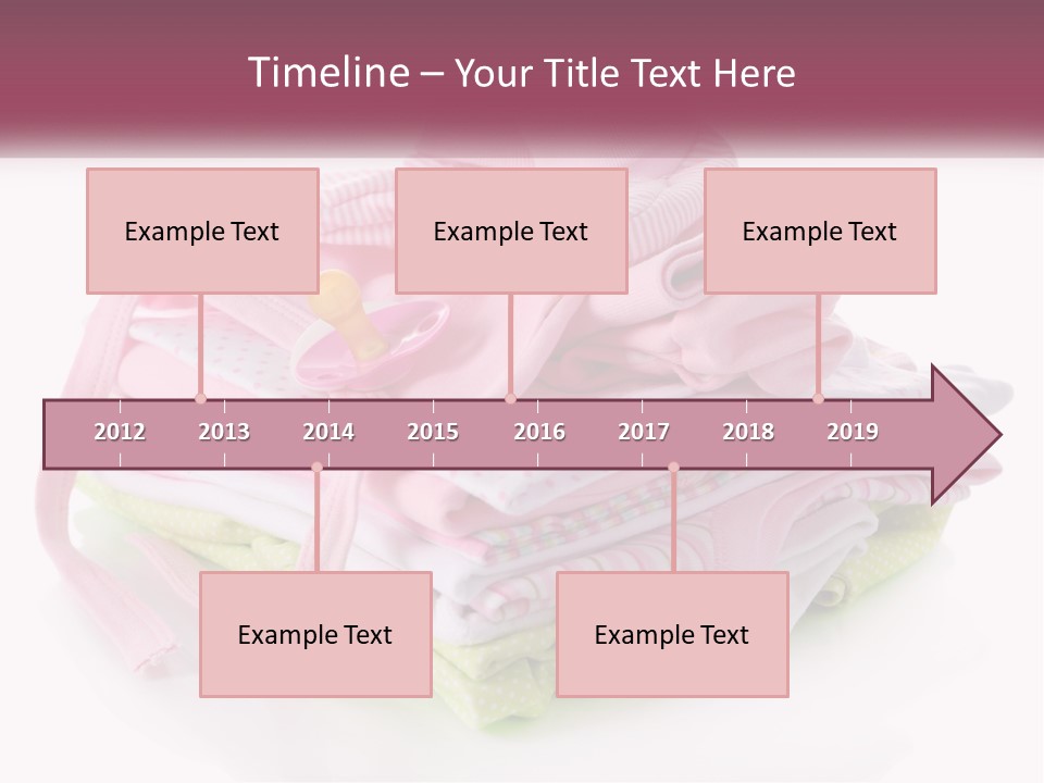 A Pile Of Baby Clothes With A Pacifier On Top Of It PowerPoint Template
