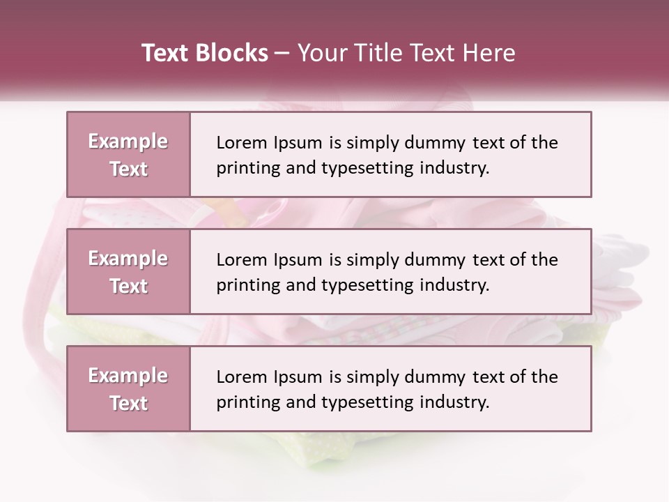 A Pile Of Baby Clothes With A Pacifier On Top Of It PowerPoint Template