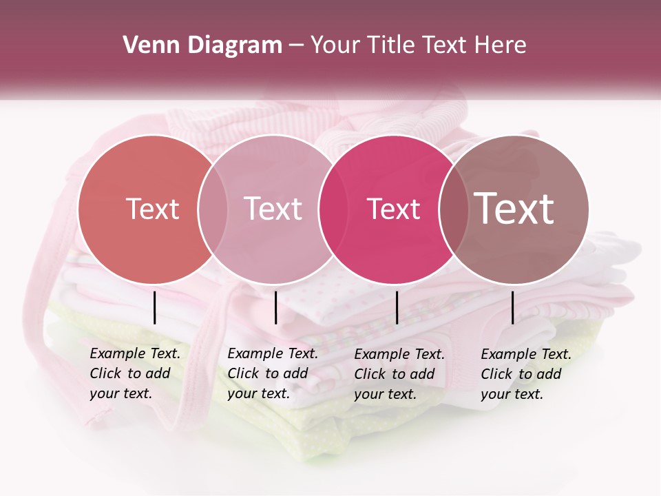 A Pile Of Baby Clothes With A Pacifier On Top Of It PowerPoint Template