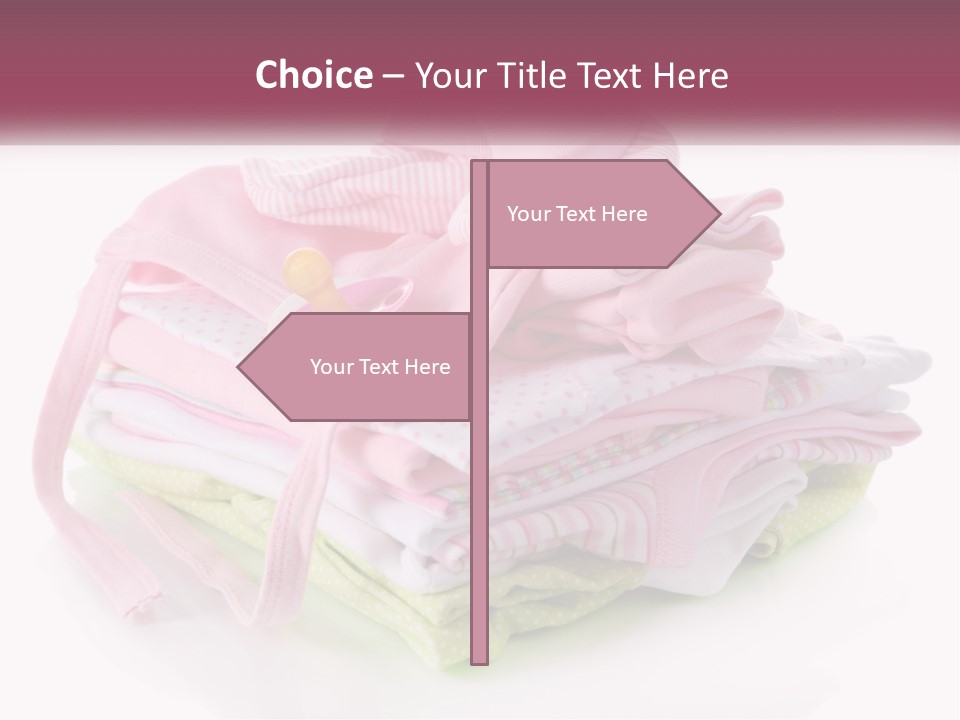 A Pile Of Baby Clothes With A Pacifier On Top Of It PowerPoint Template