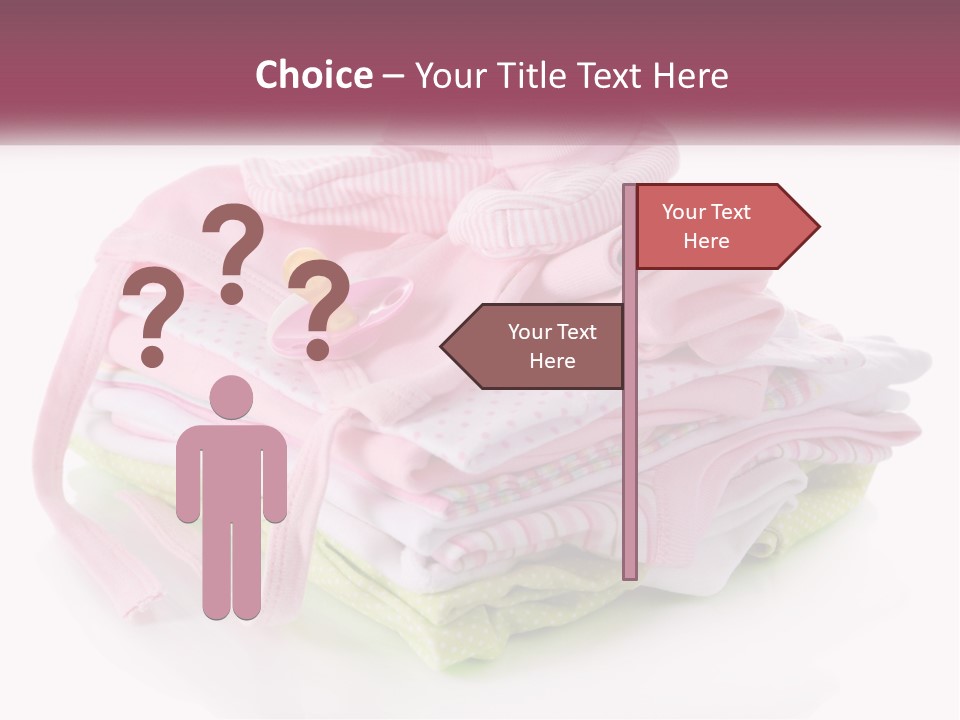 A Pile Of Baby Clothes With A Pacifier On Top Of It PowerPoint Template