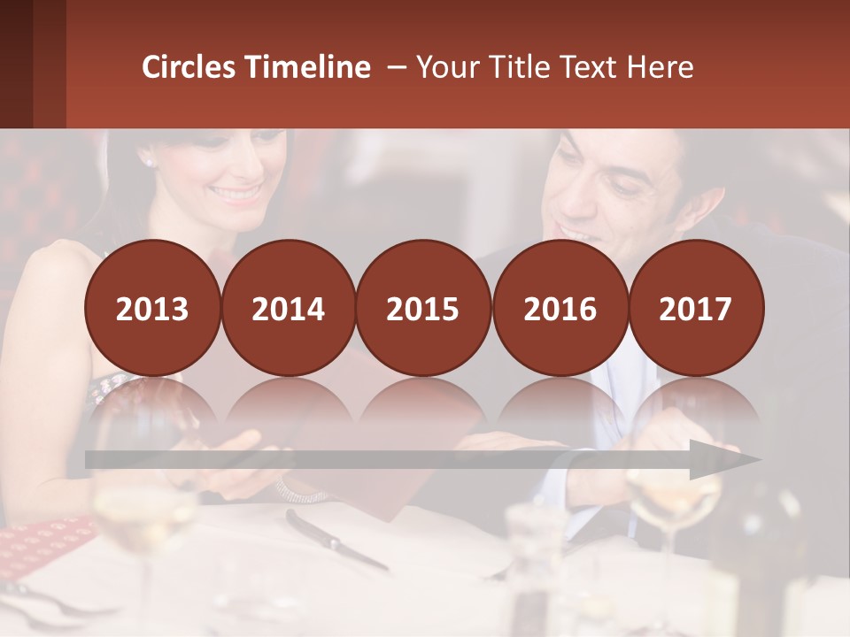 A Man And Woman Sitting At A Table With A Menu PowerPoint Template
