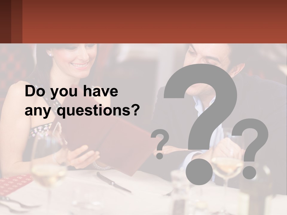 A Man And Woman Sitting At A Table With A Menu PowerPoint Template