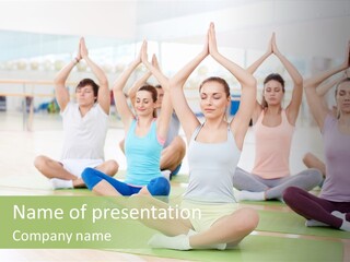 A Group Of People Doing Yoga In A Room PowerPoint Template
