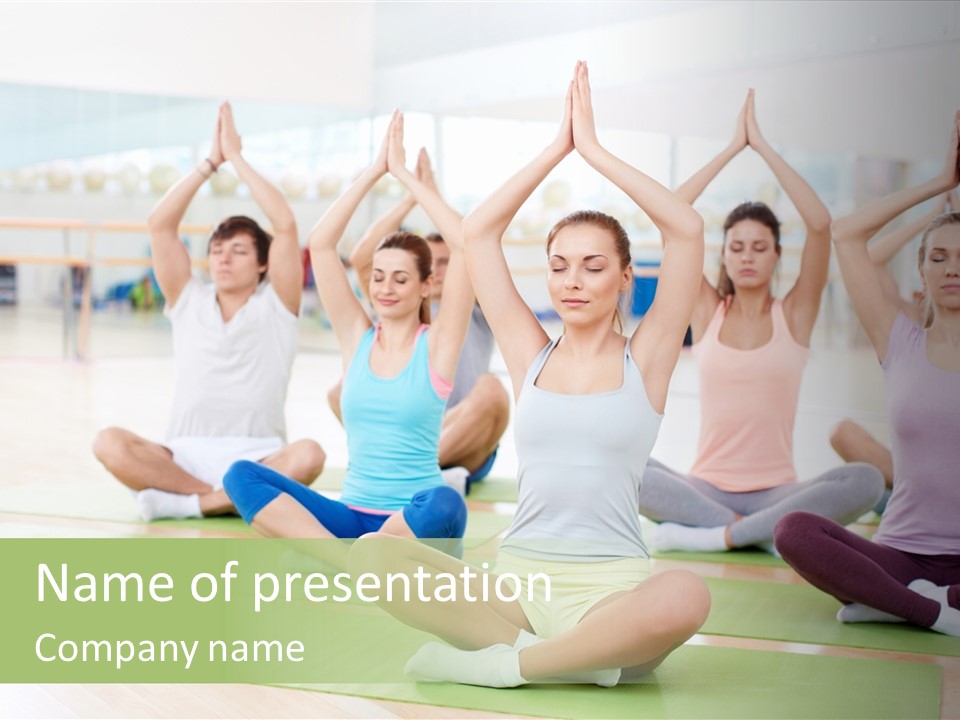 A Group Of People Doing Yoga In A Room PowerPoint Template