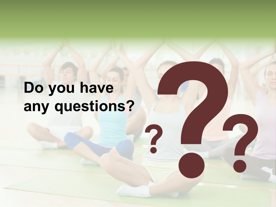 A Group Of People Doing Yoga In A Room PowerPoint Template