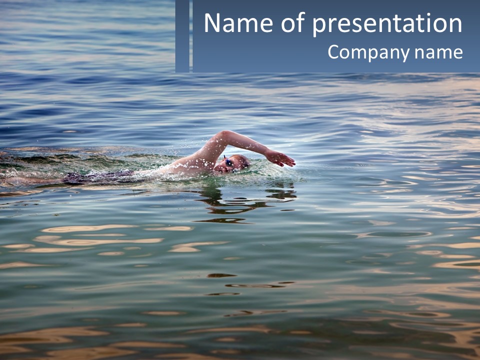 A Person Swimming In A Body Of Water PowerPoint Template