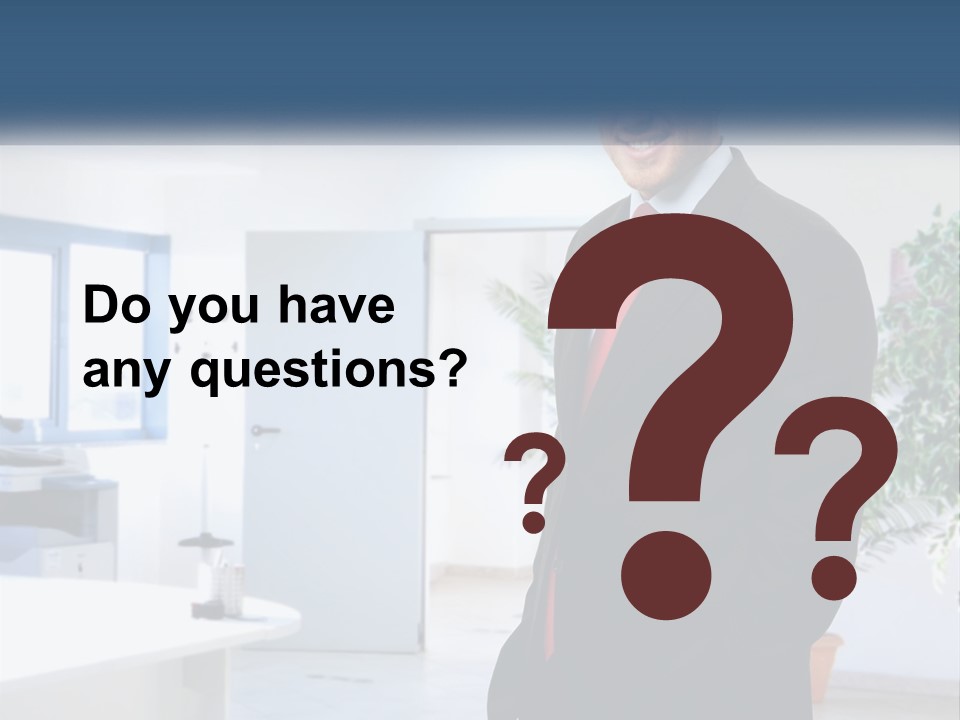 A Man In A Suit Standing In A Room PowerPoint Template