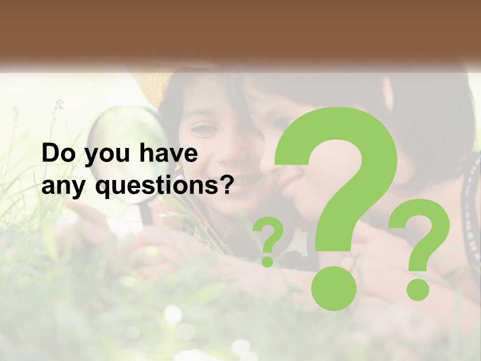 Two Children Looking Through A Magnifying Glass PowerPoint Template