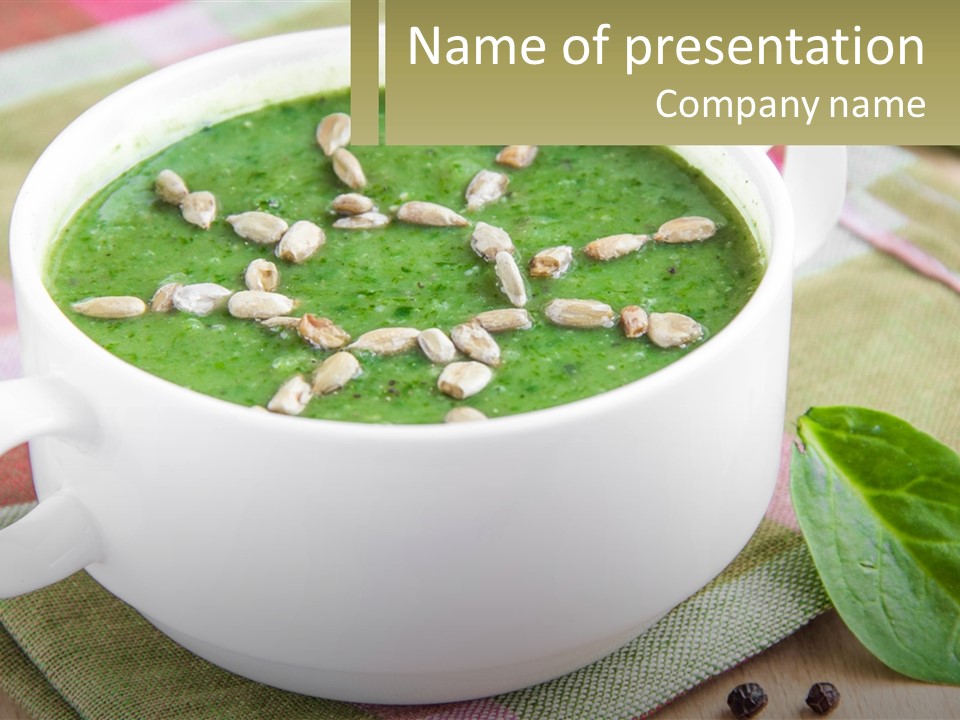 A White Bowl Filled With A Green Soup PowerPoint Template