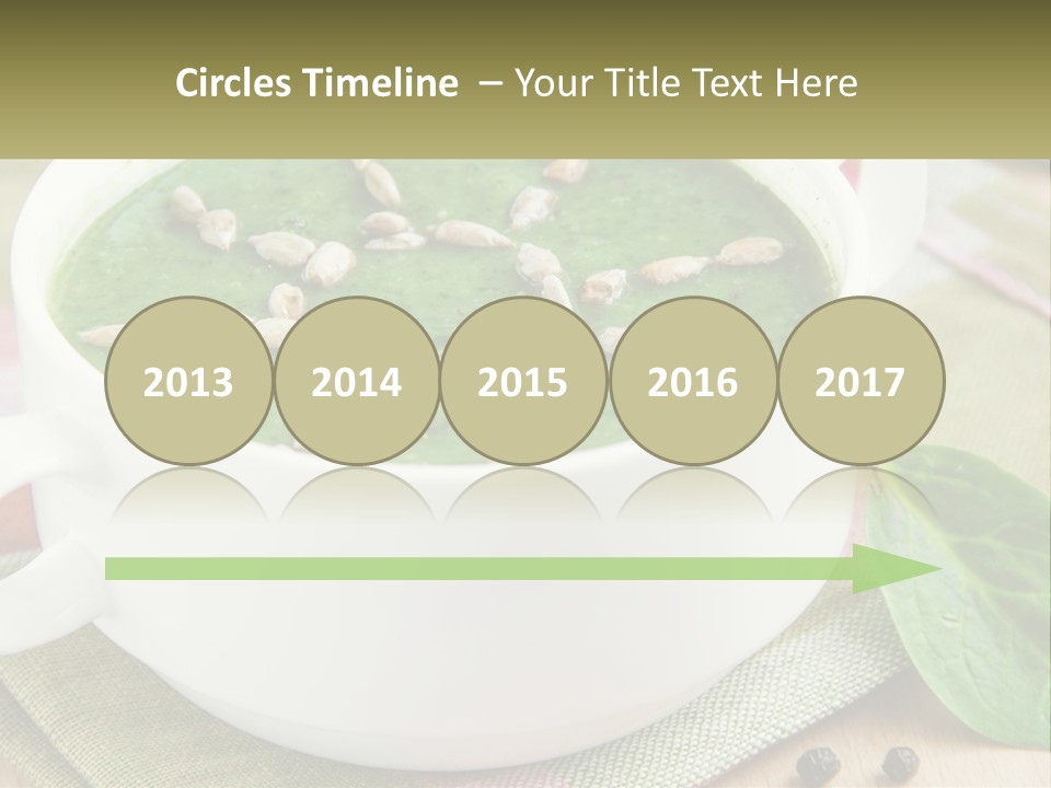 A White Bowl Filled With A Green Soup PowerPoint Template