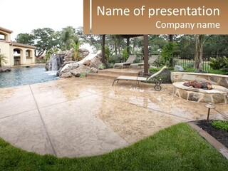 A Backyard With A Pool And A Waterfall PowerPoint Template