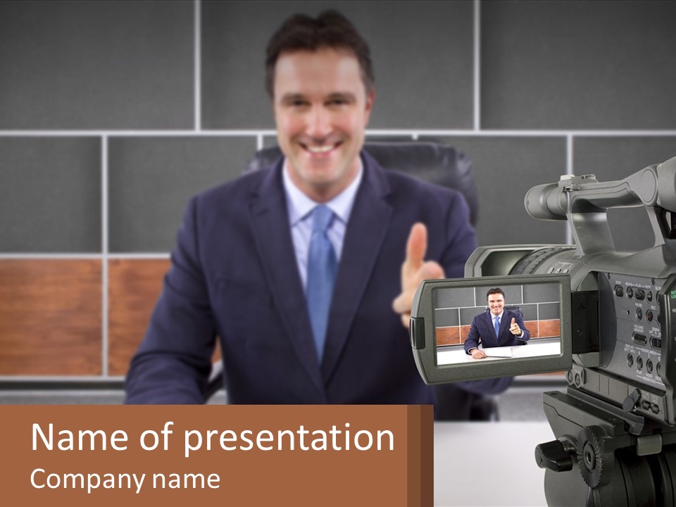 A Man Giving A Thumbs Up In Front Of A Camera PowerPoint Template