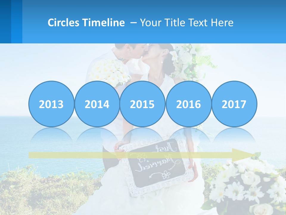 A Newly Married Couple Kissing In Front Of The Ocean PowerPoint Template
