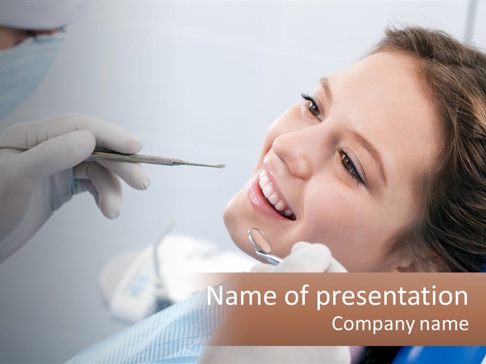 A Woman Is Smiling As She Gets Her Teeth Checked PowerPoint Template