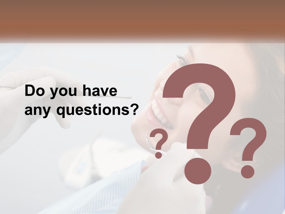 A Woman Is Smiling As She Gets Her Teeth Checked PowerPoint Template
