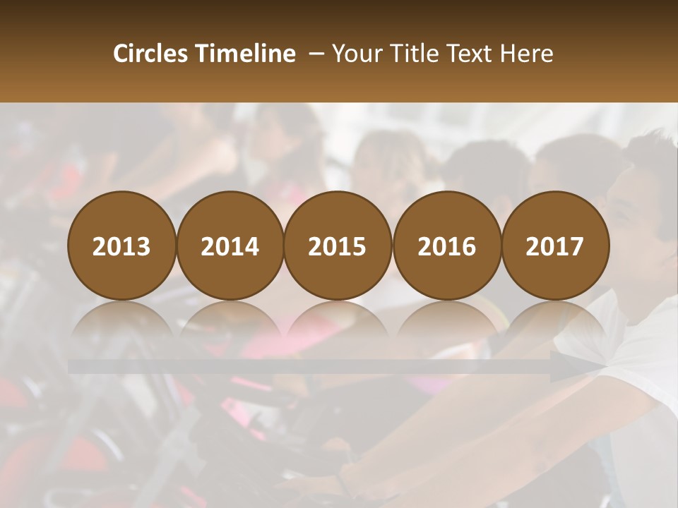 A Group Of People Riding Stationary Bikes In A Gym PowerPoint Template