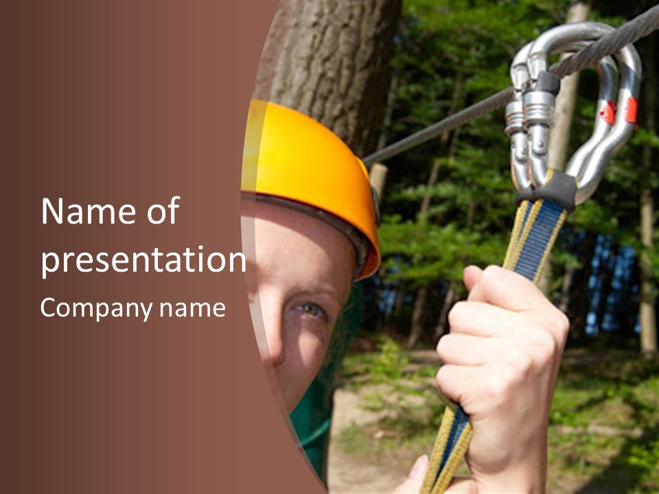 A Man Holding A Rope With A Helmet On His Head PowerPoint Template