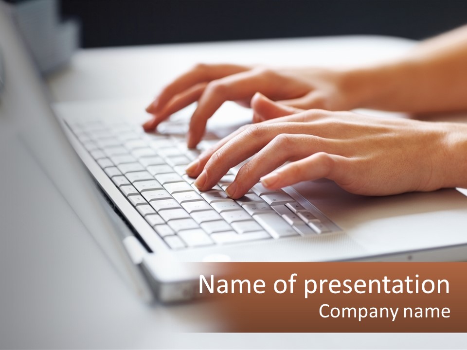 A Person Typing On A Laptop Computer PowerPoint Template